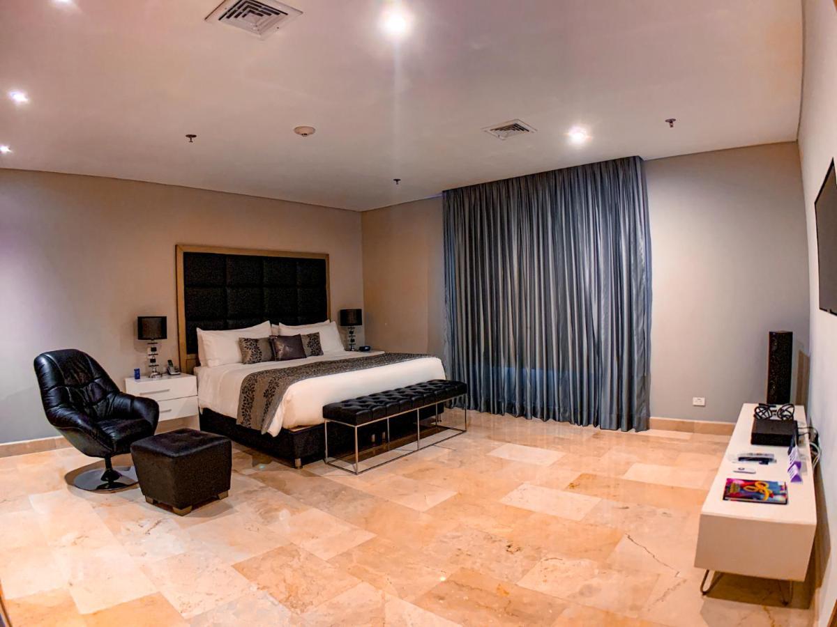 Hotel Dann Carlton Barranquilla Y Centro De Convenciones Zewnętrze zdjęcie A bedroom at the hotel